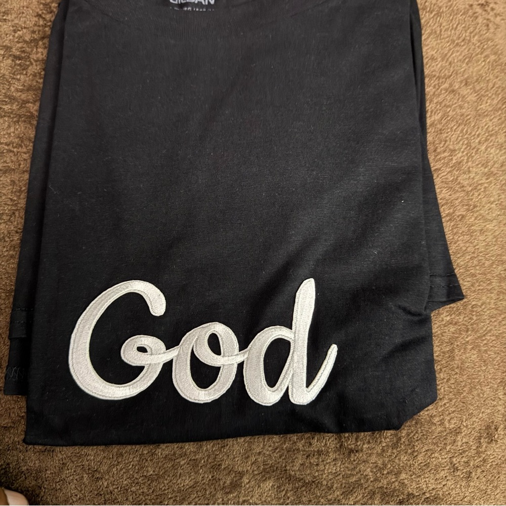 Black Tee with “God” in White Script